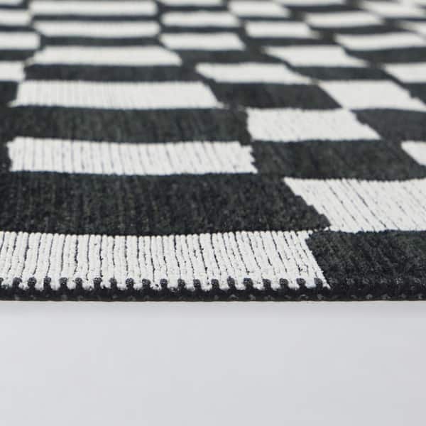 Straker Black 5 ft. 3 in. x 7 ft. Checkered Area Rug