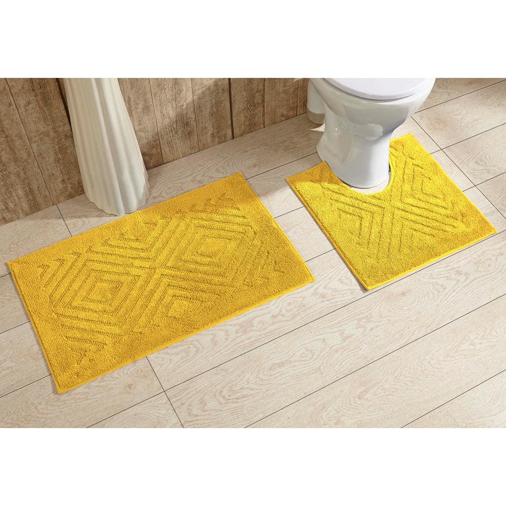 https://images.thdstatic.com/productImages/7180bbf2-02dc-4a19-8a2b-2b20712bdf61/svn/yellow-bathroom-rugs-bath-mats-ss-2pc2030ye-64_1000.jpg