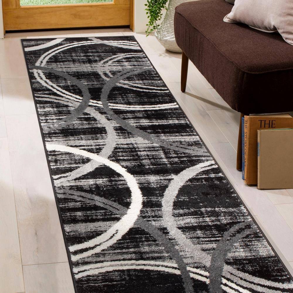 Black and Gray Abstract Synthetic 5' x 7' Area Rug
