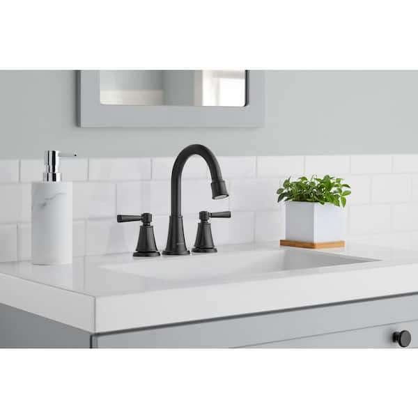 https://images.thdstatic.com/productImages/7199e157-fcf9-4399-bf19-bca8003c1663/svn/matte-black-glacier-bay-widespread-bathroom-faucets-hd67485w-6110h-a0_600.jpg