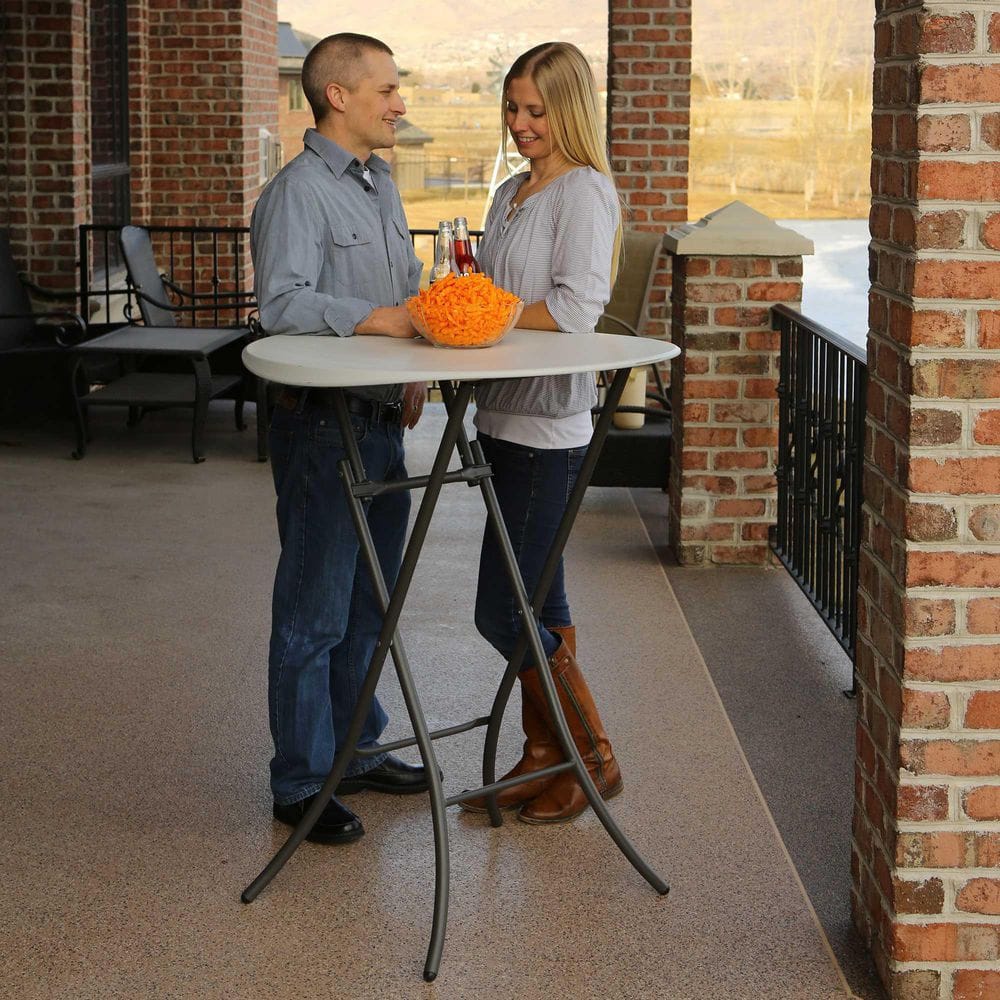Almond HDPE 33" Round Bistro Table with Bronze Steel Legs