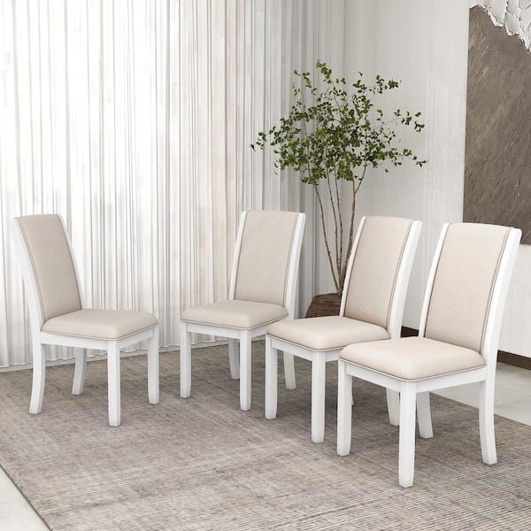 White cloth dining deals chairs