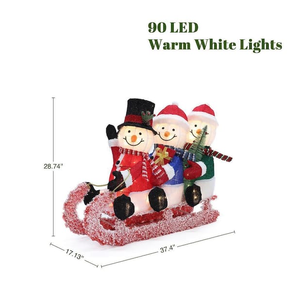 LuxenHome 29 in. Lighted Snowman Family on Sled in Winter Coats