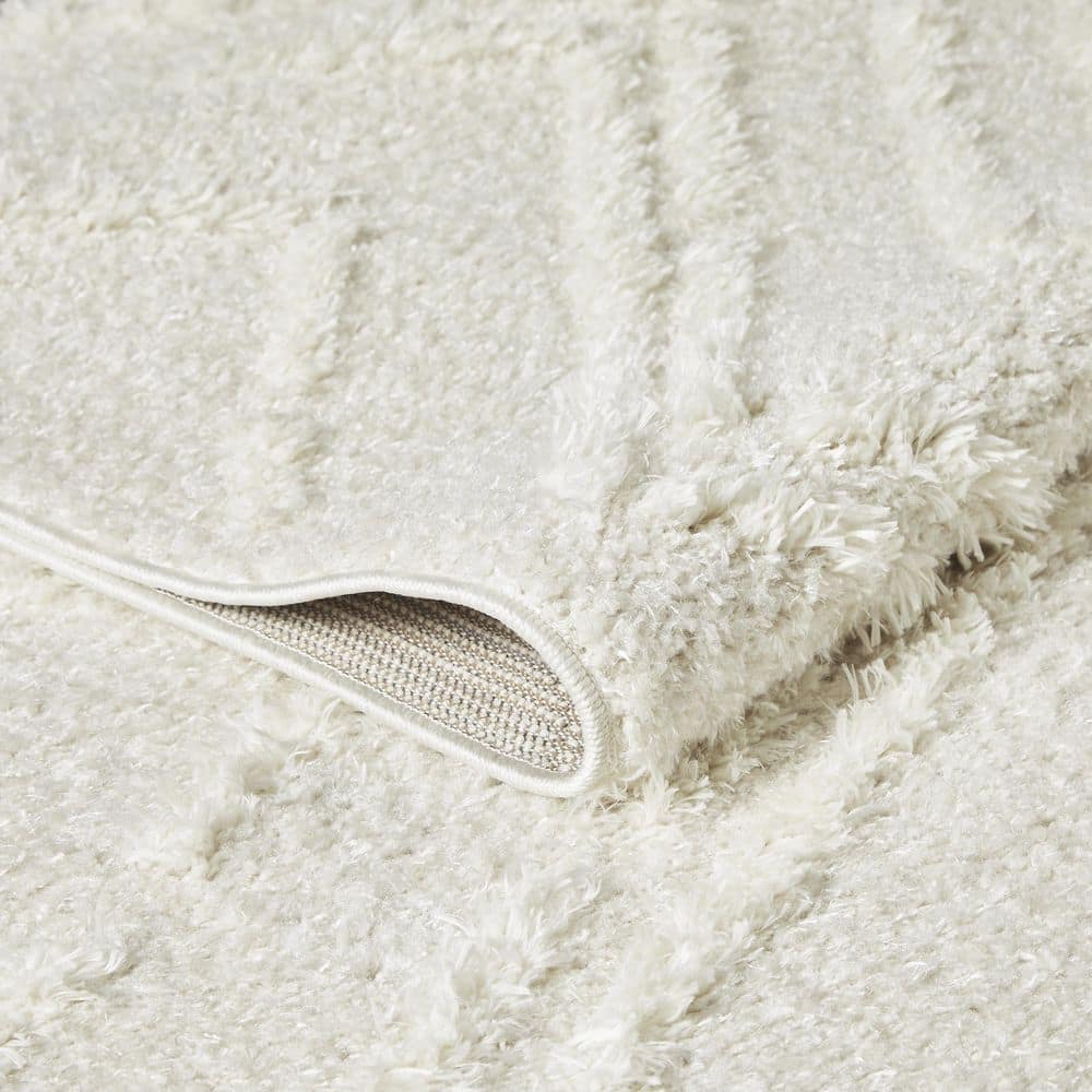 Cream 9' x 12' Stain-Resistant Synthetic Area Rug