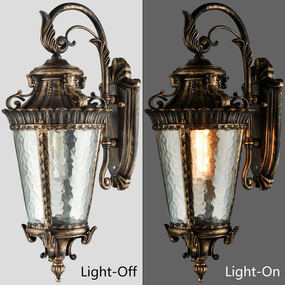 Antiqued Bronze Outdoor Sconce with Clear Water Glass Shade