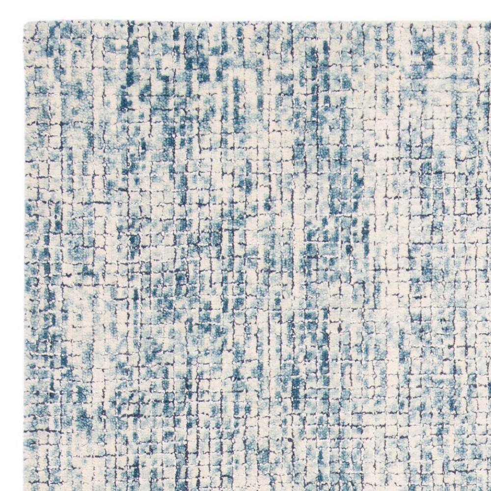 Ivory and Navy Abstract Wool 4' x 6' Area Rug