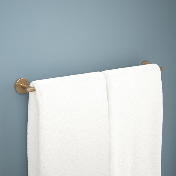 Trinsic 24 in. Towel Bar in Champagne Bronze