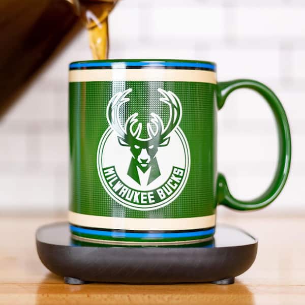https://images.thdstatic.com/productImages/7202a890-ec33-41ef-93ef-c1a4764a796f/svn/green-uncanny-brands-drip-coffee-makers-mw1-nba-buk-lg1-31_600.jpg
