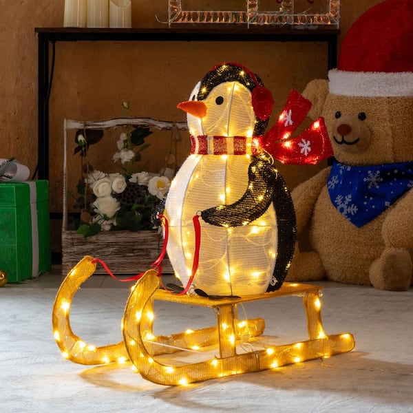 Karl home 26 in. Pre-Lit Penguin with Sleigh Christmas
