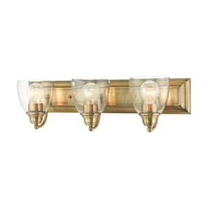 Thacher 24 in. 3-Light Antique Brass Vanity Light with Clear Glass