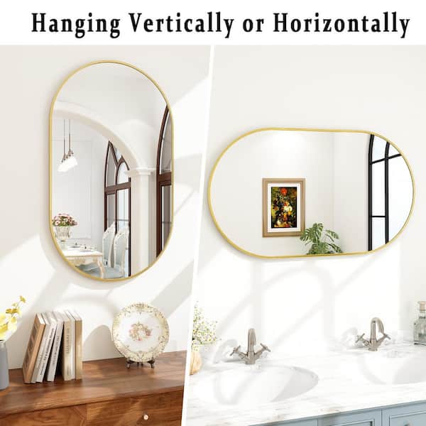 22 in. W x 38 in. H Oval Metal Framed Wall Bathroom Vanity Mirror Gold