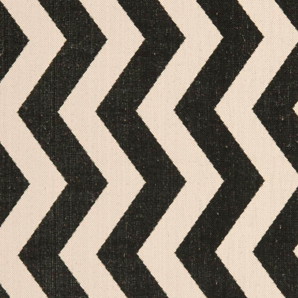 Courtyard Collection 54" Round Black/Beige Synthetic Area Rug