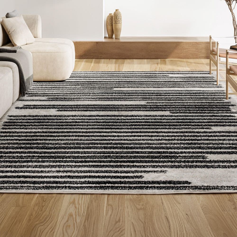 Khalil 8' x 10' Black and Cream Synthetic Stripe Rug