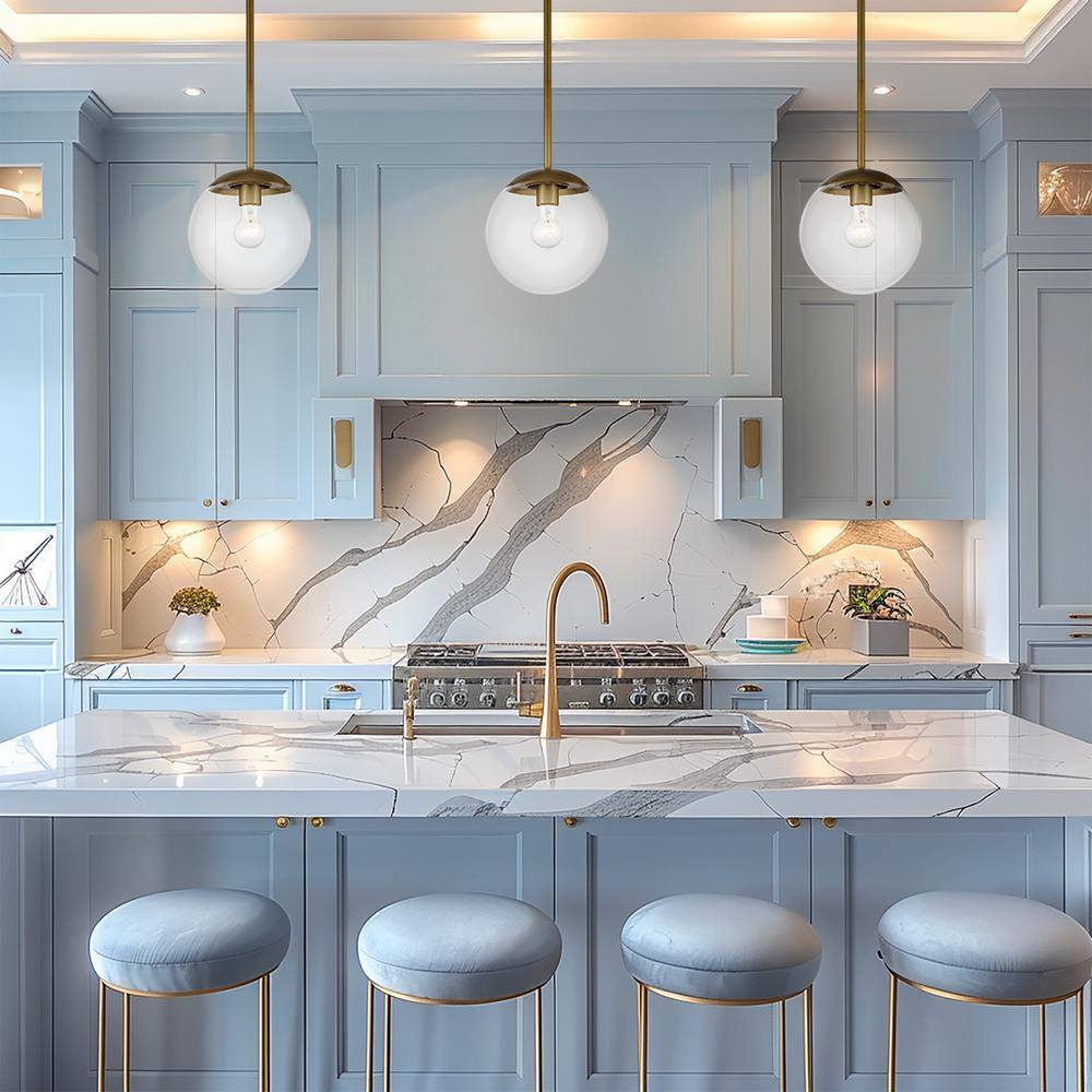 Auresa Modern Mini Pendant Light in Soft Brass with Clear Glass Orb