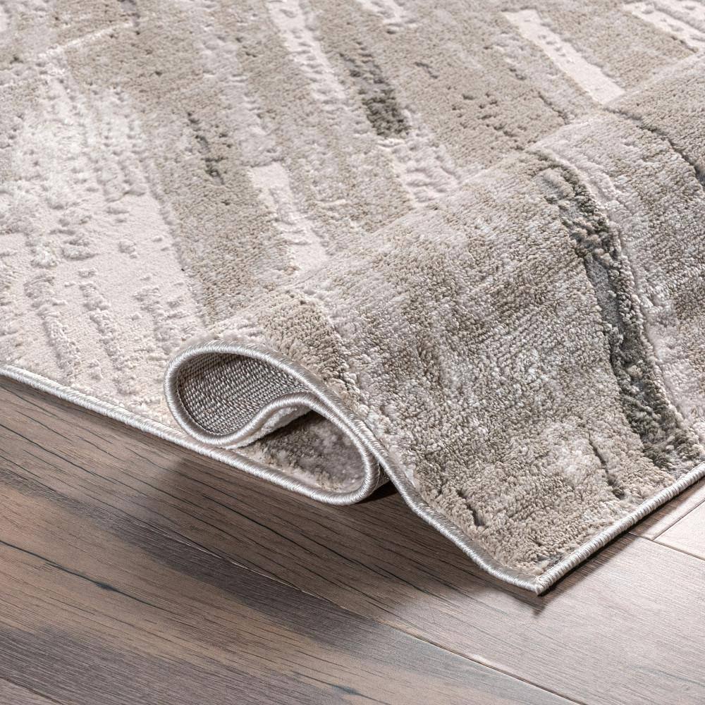Beige and Black Abstract Synthetic 5' x 8' Area Rug