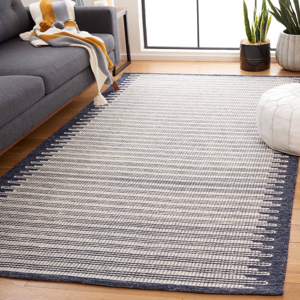 Ivory and Navy Tufted Wool Rectangular Area Rug, 5' x 8'