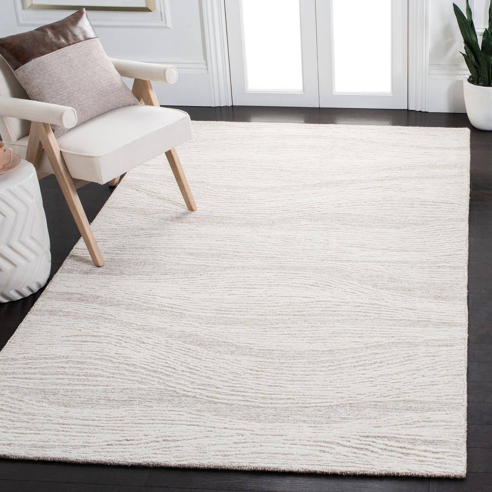 Ivory Hand-Tufted Wool Round Area Rug, 5' x 8'