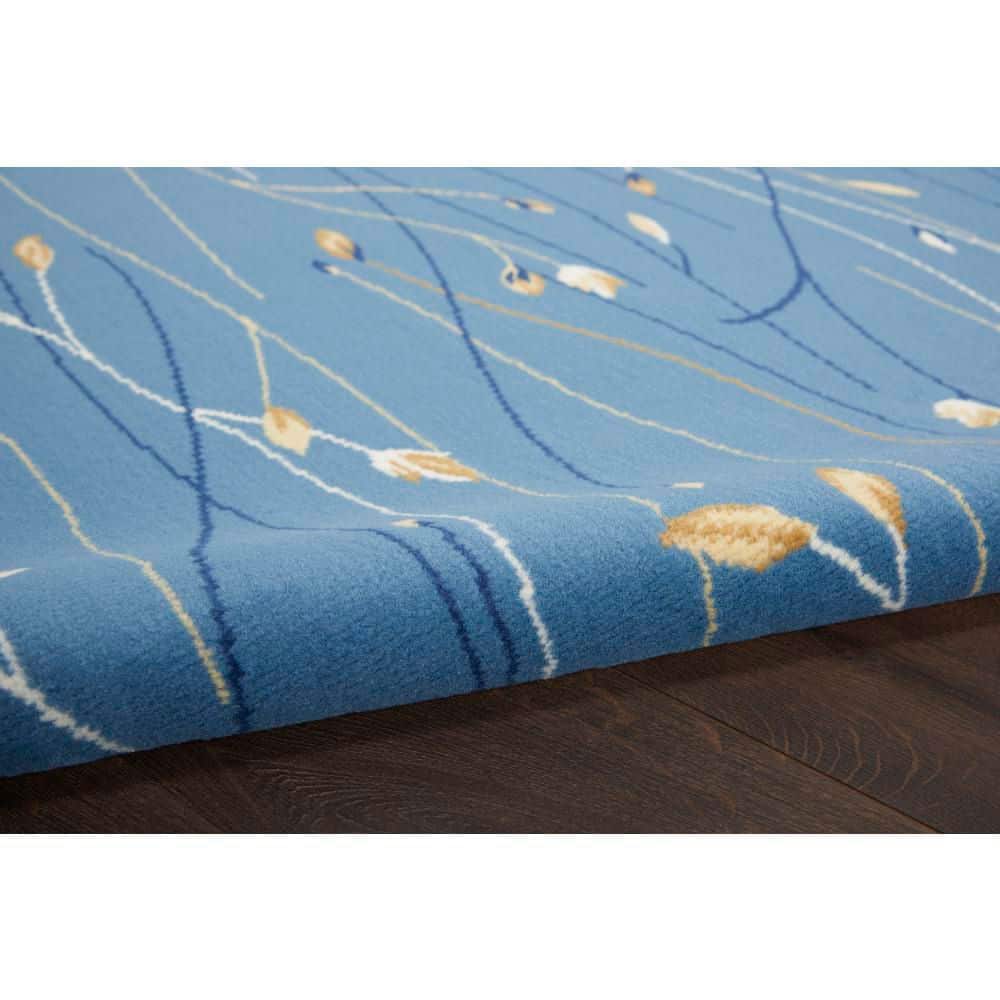 Light Blue Floral Round Synthetic Area Rug 5'3"