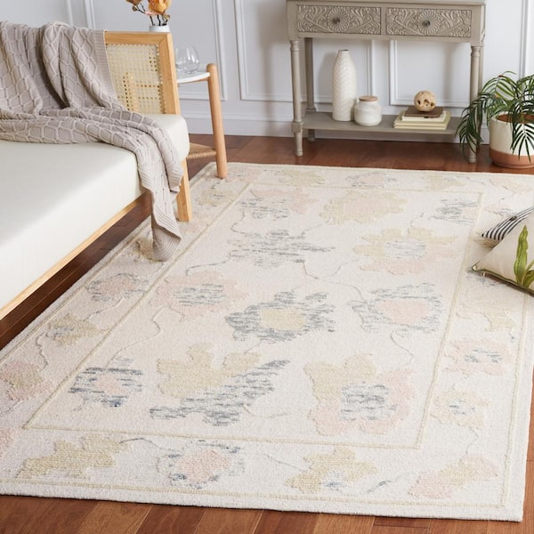 Abstract Ivory/Beige 8 ft. x 10 ft. Border Distressed Floral Area Rug