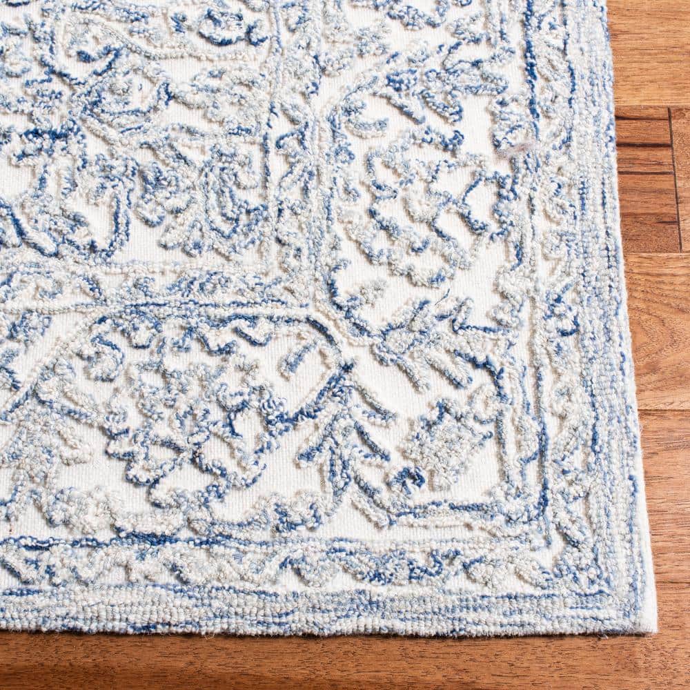 Ivory and Blue Hand-Tufted Wool 8' x 10' Area Rug