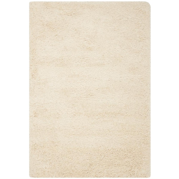 SAFAVIEH Santa Monica Shag Ivory 5 ft. x 8 ft. Solid Area Rug