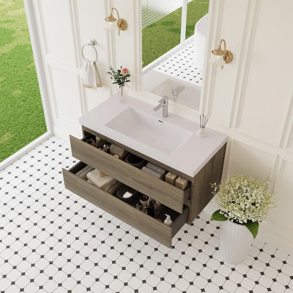 42 in. W x 19-3/4 in. D x 22-1/5 in. H Bathroom Wall Hung Vanity in White with Single Basin Vanity Top in White Resin