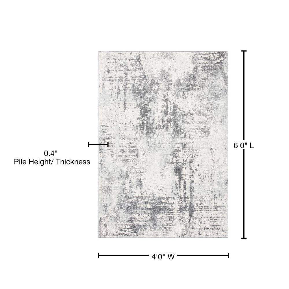 Ivory Abstract 4' x 6' Reversible Synthetic Area Rug