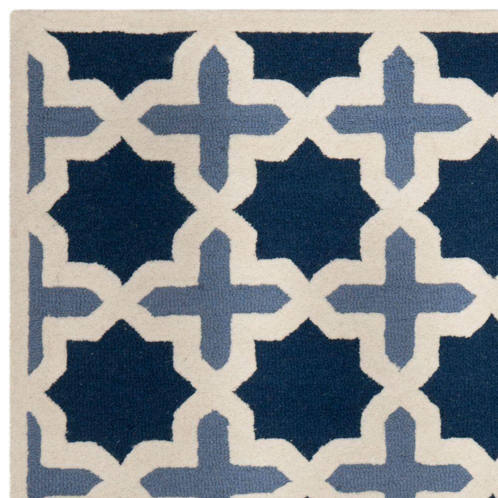 Handmade Blue and Ivory Wool Geometric Area Rug, 10' x 14'