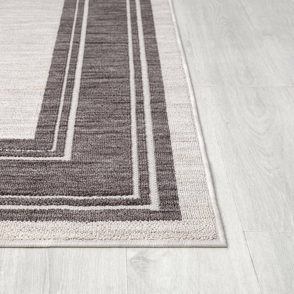 Winona 5' x 7' Ivory Rectangular Synthetic Area Rug
