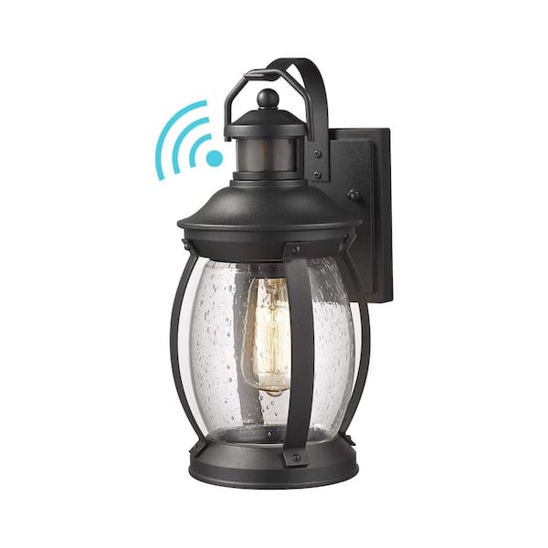 JAZAVA 1-Light Black Motion Sensing Non Solar LED Outdoor with Seeded Glass Shade Wall Lantern Sconce Light