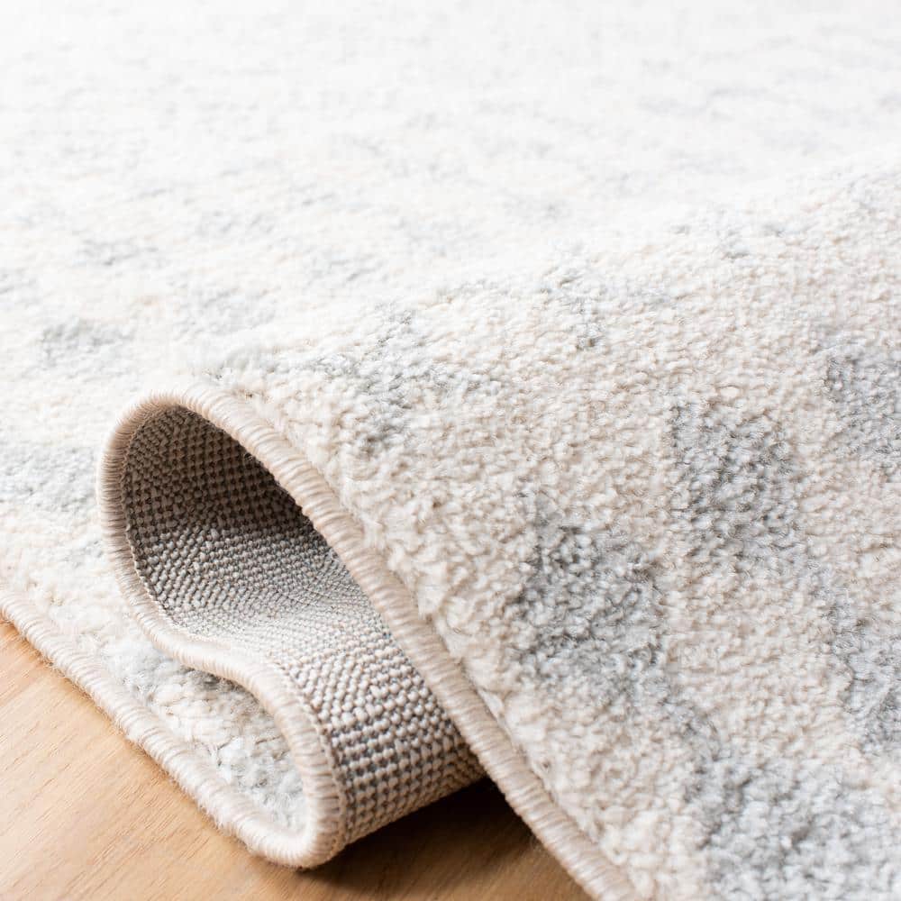 Ivory and Terracotta 79" Square Hand-Knotted Easy-Care Area Rug