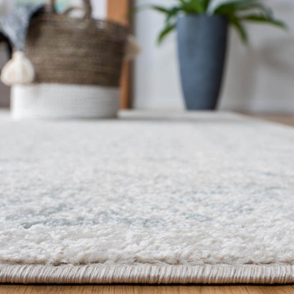 Gray Geometric 6' x 9' Hand-Knotted Synthetic Area Rug