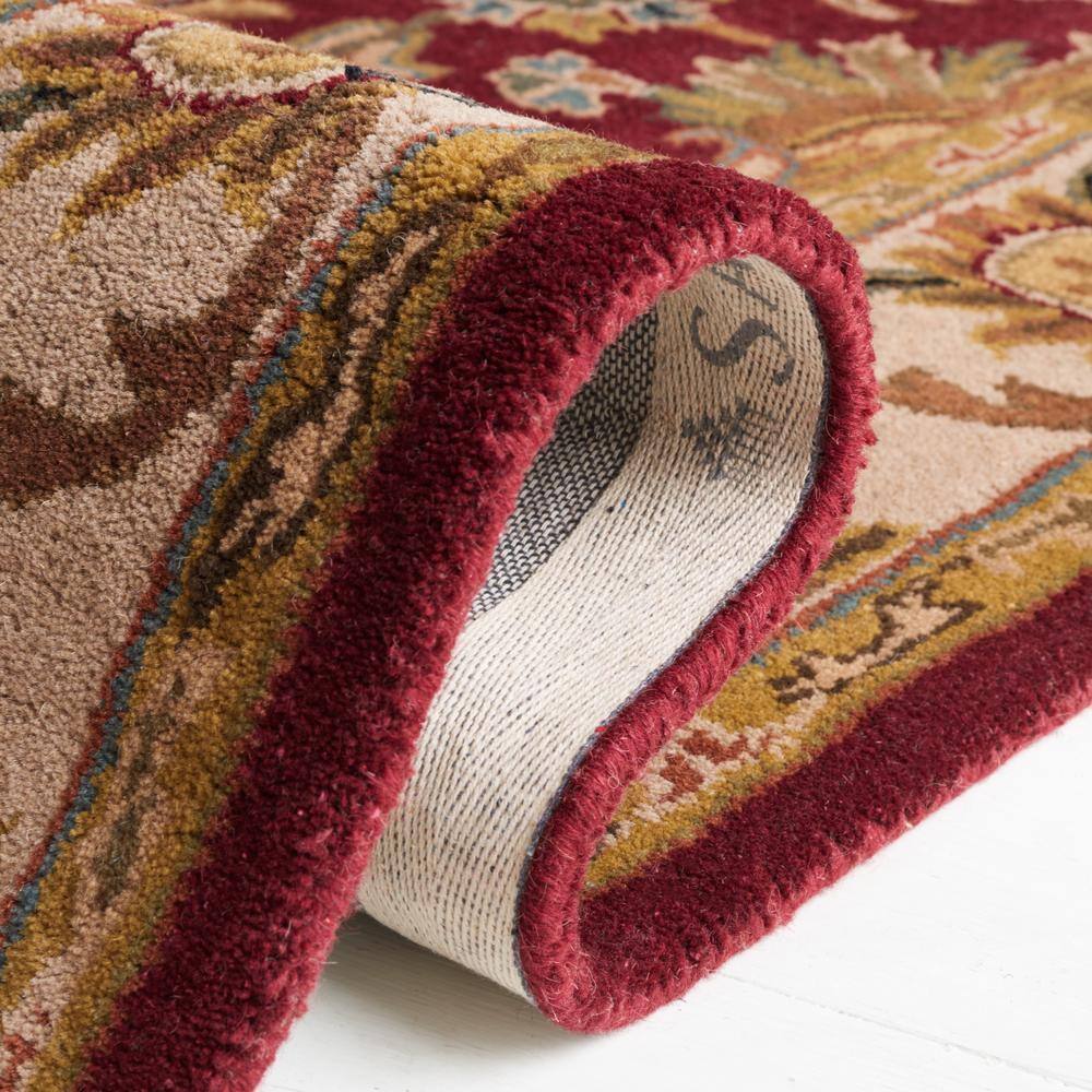 Hand-Tufted Red and Ivory Wool Oval Area Rug 8' x 10'