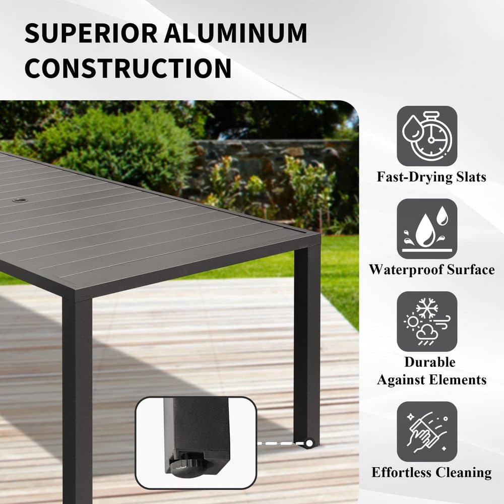 Close-up of the black metal dining table showing its waterproof and durable features.