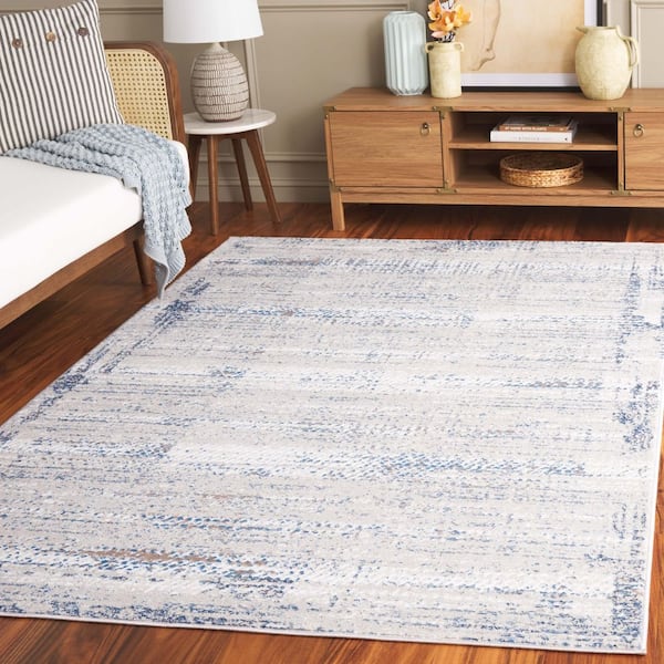 Prestige 8 ft. x 10 ft. Ivory/Blue Abstract Area Rug