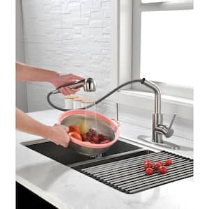 Single Handle Deck Mount Pull Out Sprayer Kitchen Faucet with Deckplate Included in Brushed Nickel