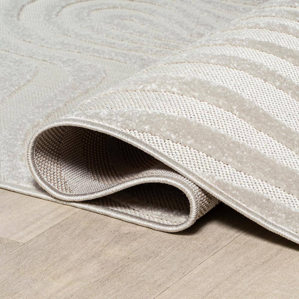 Cream and Ivory 8' x 10' High-Low Striped Synthetic Area Rug