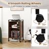 A mobile record player stand with a turntable on top and caster wheels.