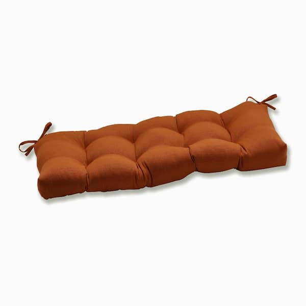 Pillow Perfect Solid Rectangular Outdoor Bench Cushion in Orange