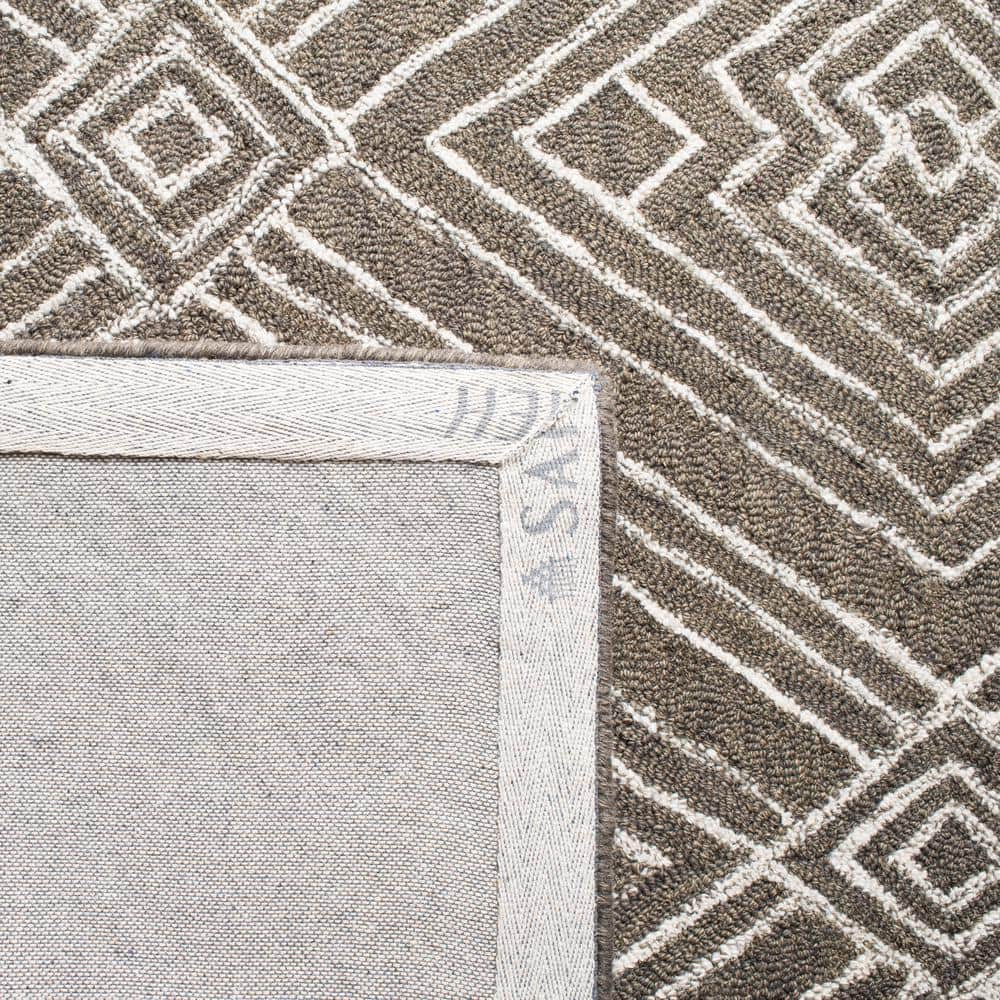 Handmade Dark Grey and Ivory Wool Tufted Round Area Rug