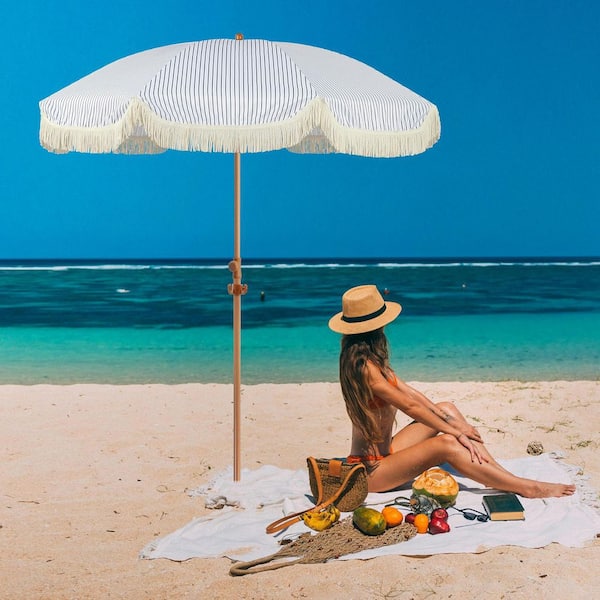 blue fringe patio umbrella Patio Kingdom kind beach umbrella is effective UV protection Ainfox 7.5ft Boho Fringe Patio