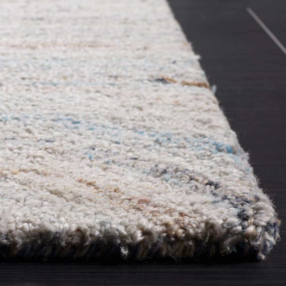 Blue and Beige Abstract 8' x 10' Hand-Tufted Wool Area Rug