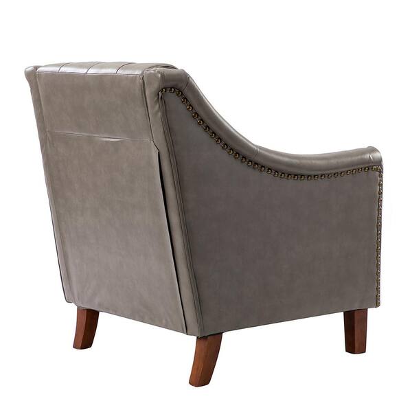 grey studded armchair