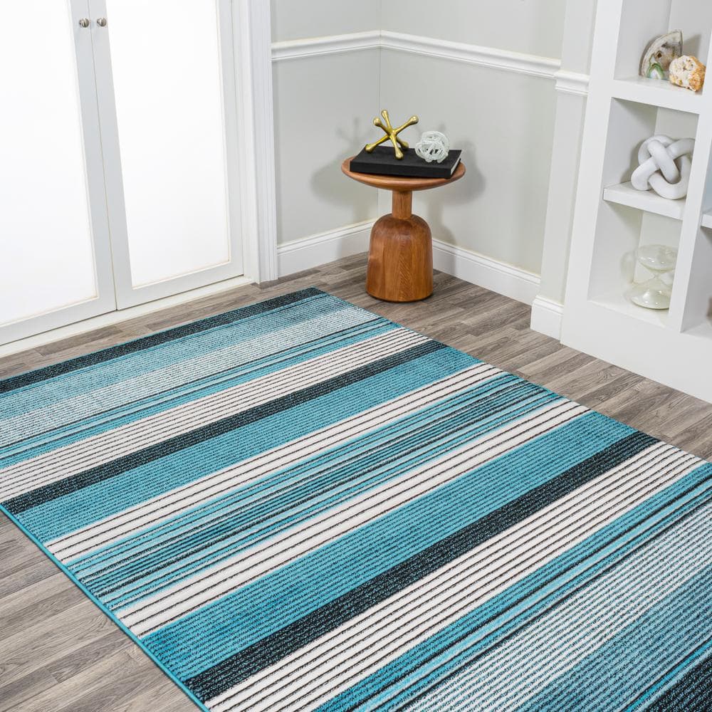 5' x 8' Blue and Navy Gradient Striped Synthetic Area Rug