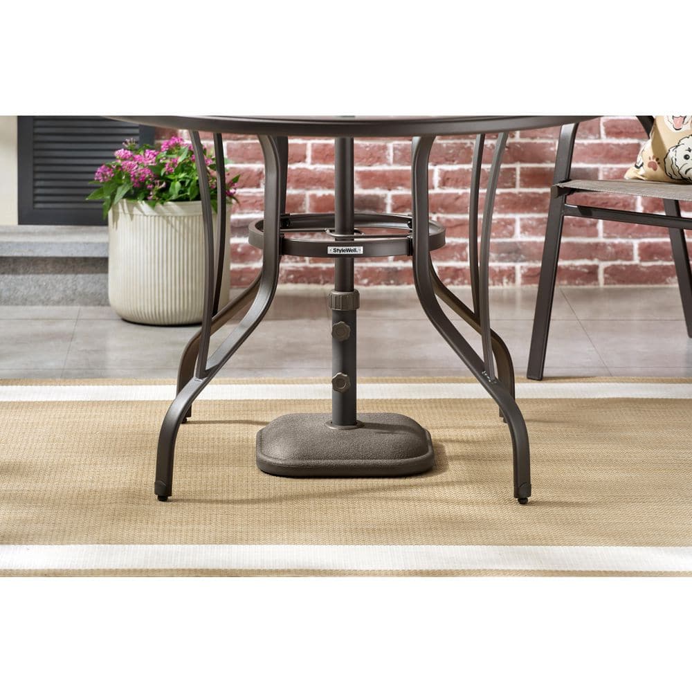 26 lbs. patio umbrella base in brown VINEY Iron Heavy Duty Weight Base Market Umbrella Base Weighted Base Outdoor Patio Table Umbrella Stand, Rust Resistant (26 lbs, Dark Brown) : Buy Online at Best Price this umbrella holder accommodates umbrella poles ranging from 1.3 to 1.8 in diameter US Weight 26 Pound Umbrella