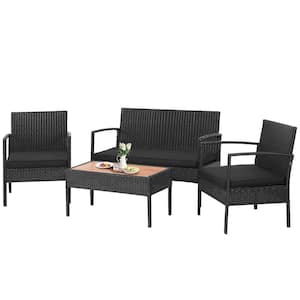 4-Piece Wicker Patio Conversation Seating Set with Wooden Tabletop and Black Cushions