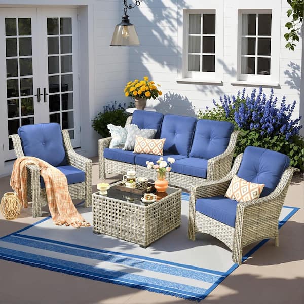 Harpera 4-Piece Wicker Outdoor Patio Conversation Sofa Seating Set with Coffee Table and Navy Blue Cushions