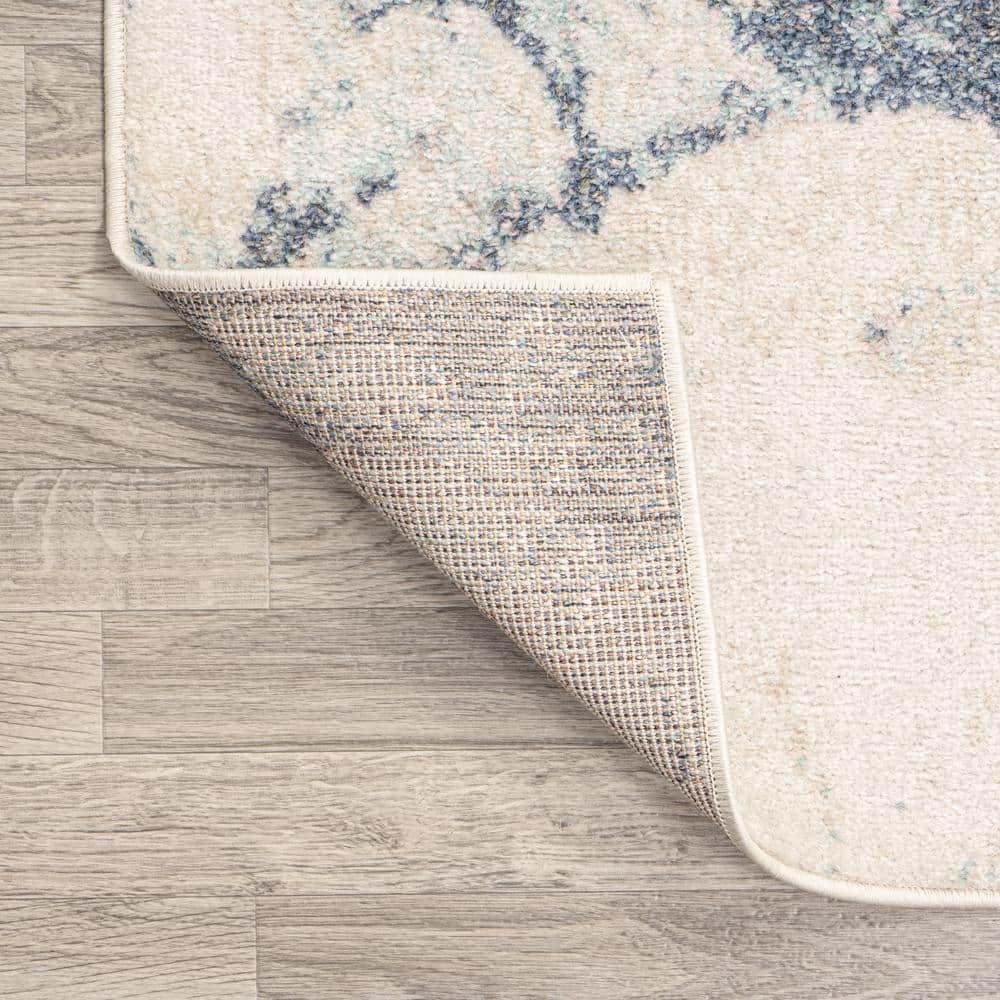 Blue and Cream Abstract 8' x 10' Synthetic Area Rug