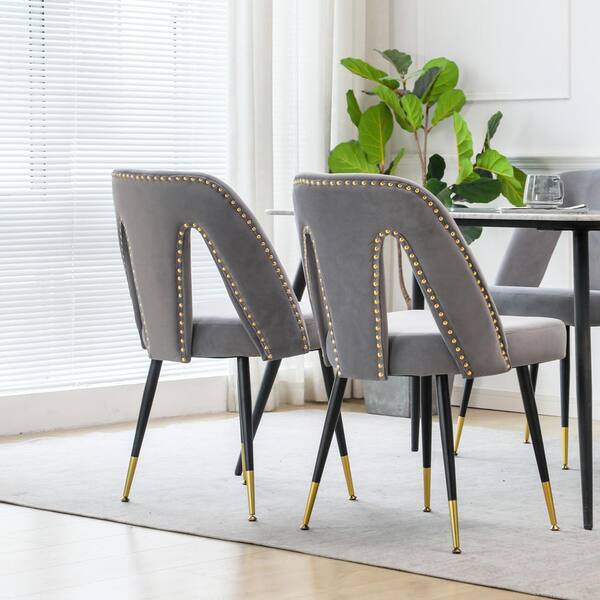 https://images.thdstatic.com/productImages/73eea968-82b8-438b-b988-2f312f21f53d/svn/gray-dining-chairs-lj419dc2-gr2-c3_600.jpg