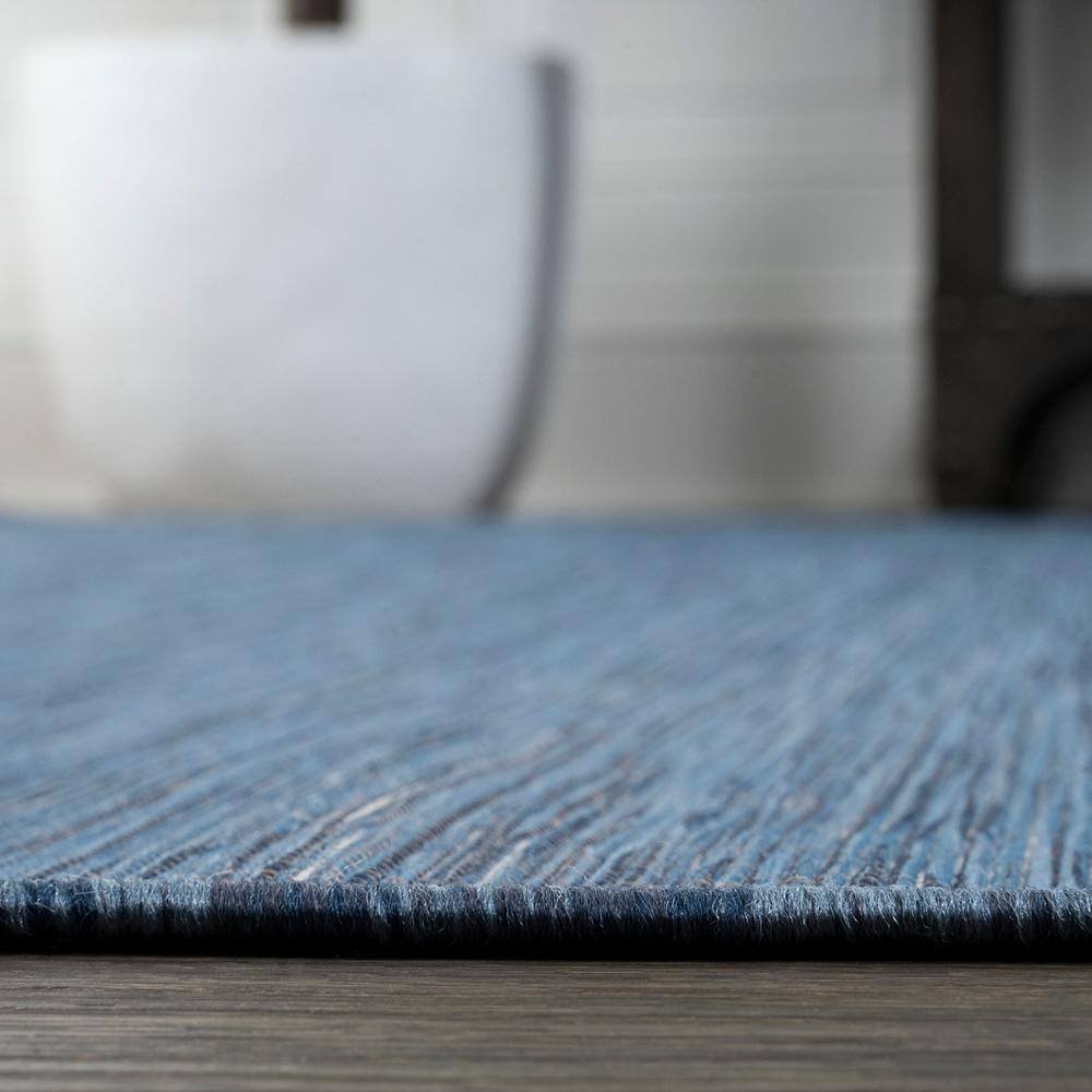 Blue 5' x 7' Solid Synthetic Flat Woven Reversible Rug